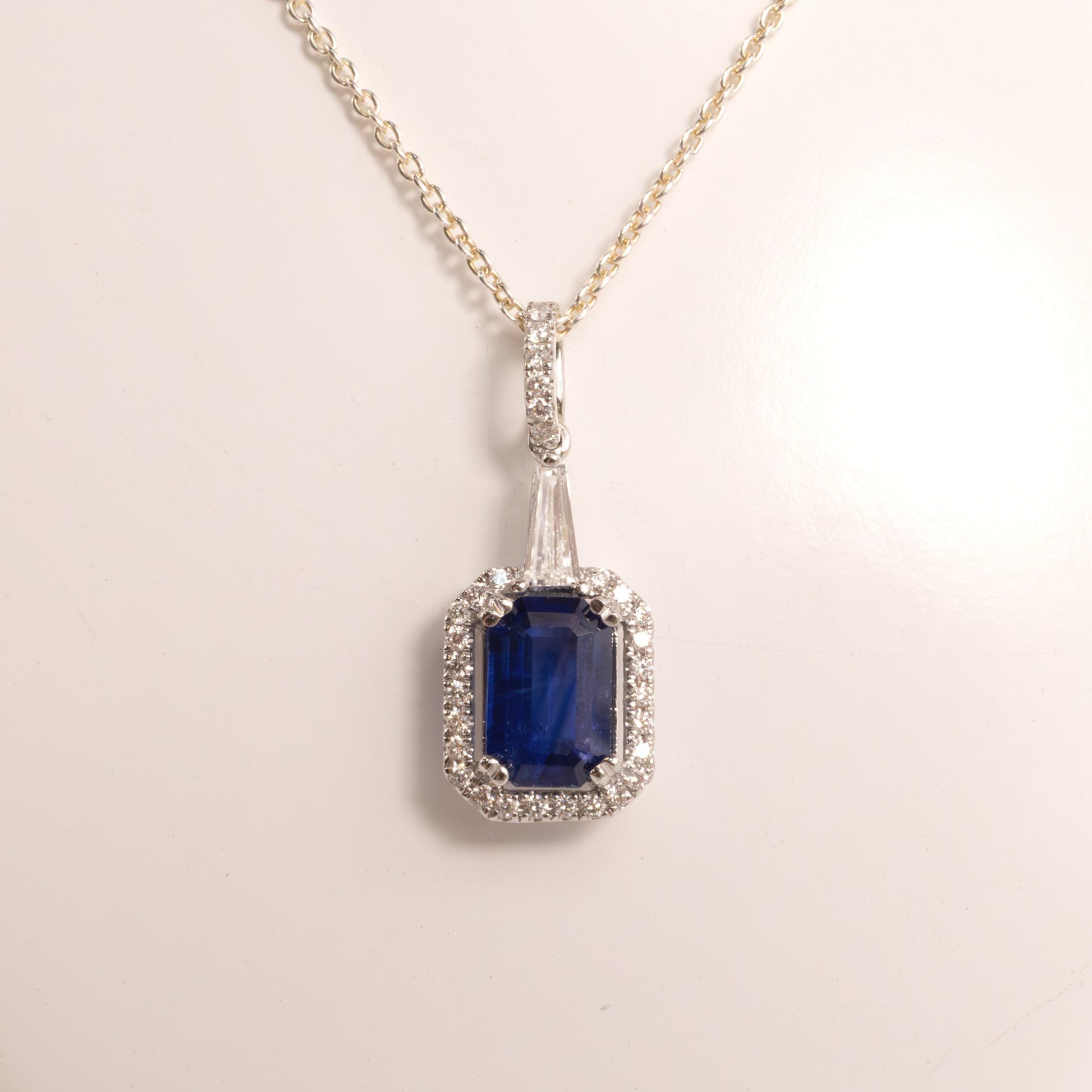 14KWG Blue Sapphire Emerald Cut and Diamond Halo Pendant