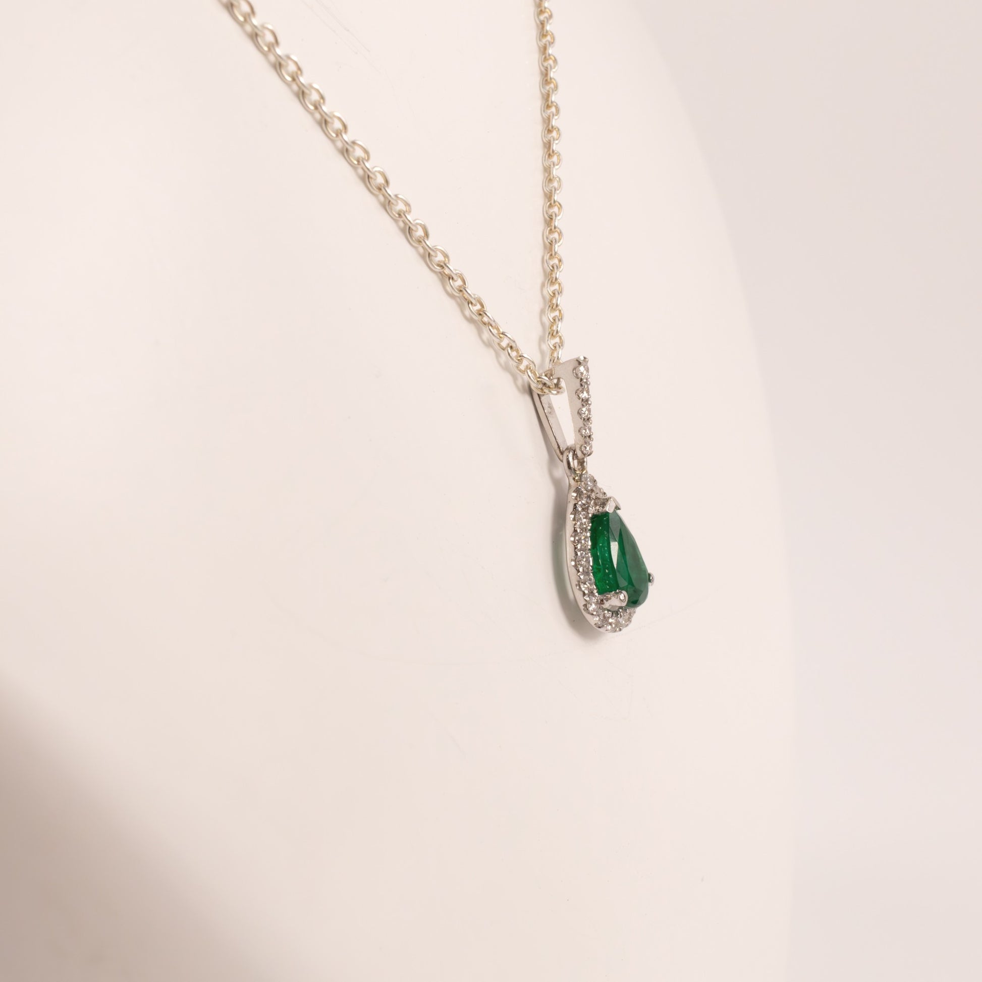 18KWG Emerald Pear Cut and Diamond Halo Pendant