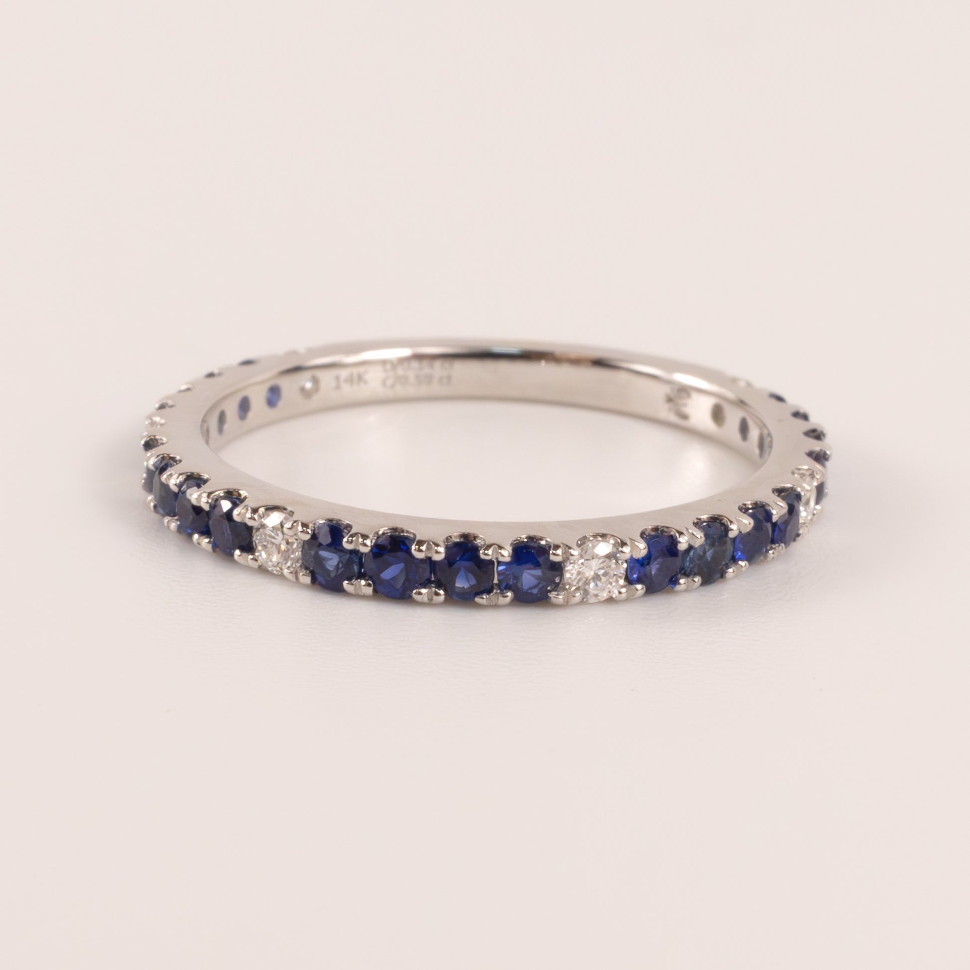 14KWG Sapphire 0.59cttw and Diamond 0.13cttw Band