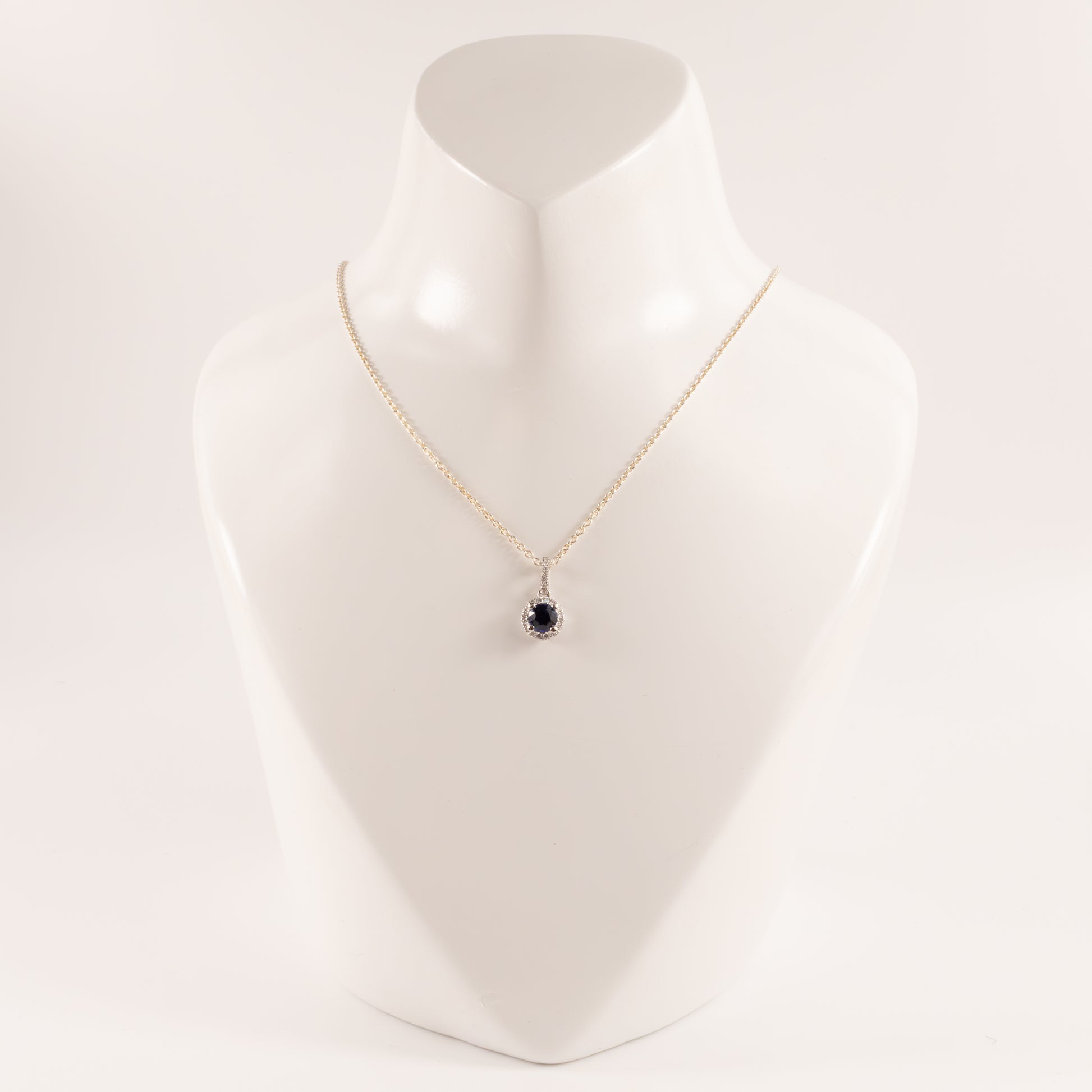 14KWG Blue Sapphire 0.53ct and Diamond 0.09cttw Halo Pendant
