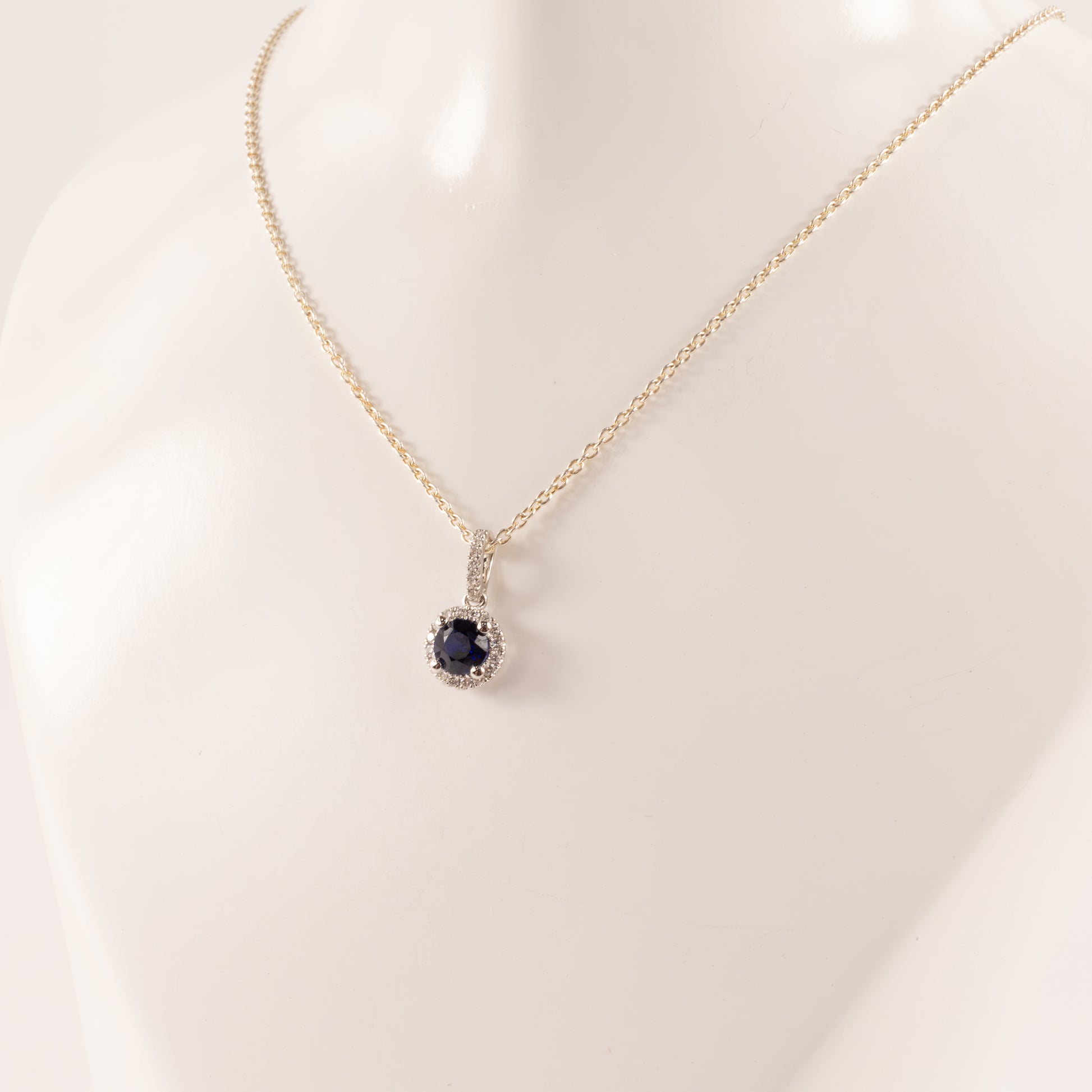14KWG Blue Sapphire 0.53ct and Diamond 0.09cttw Halo Pendant