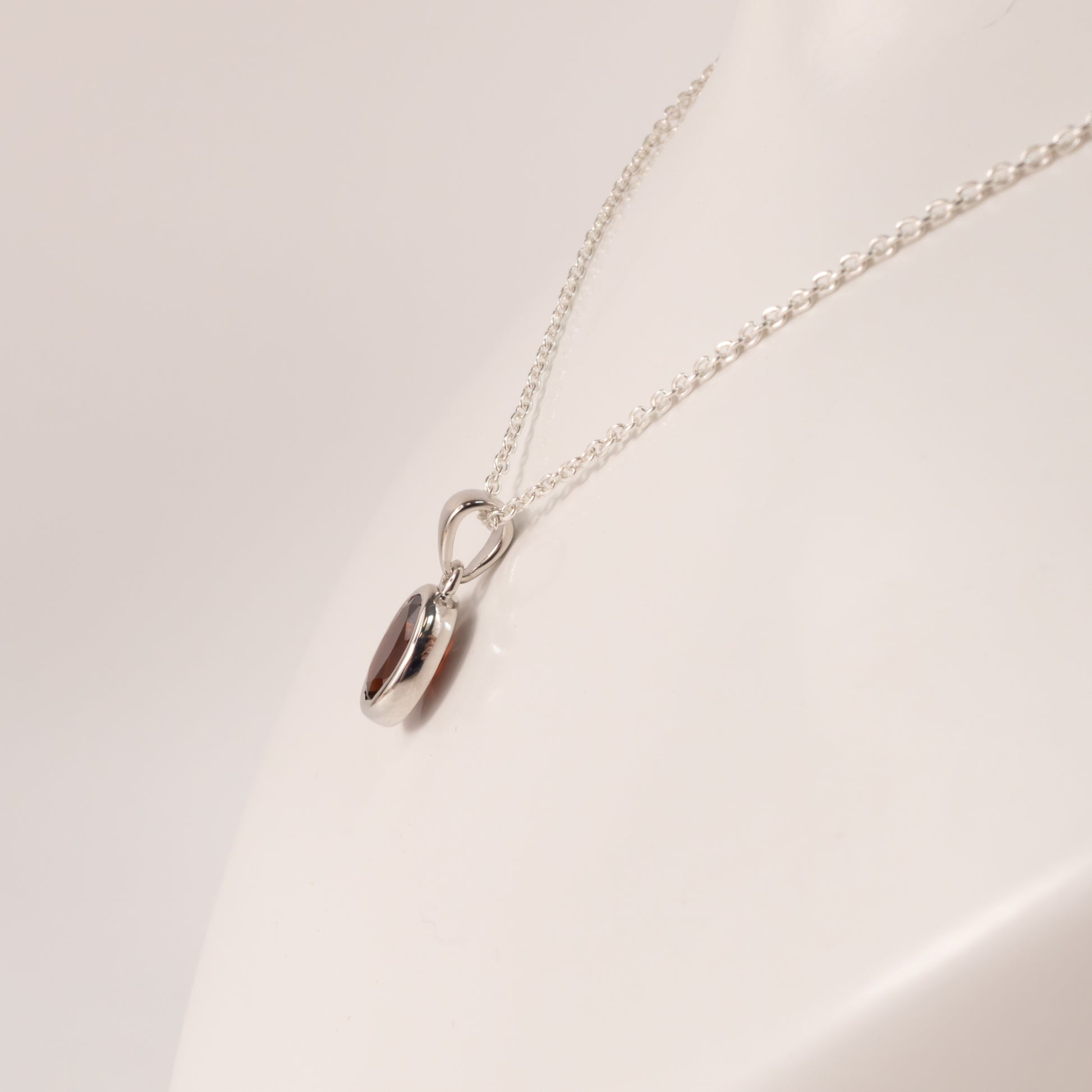 Sterling Silver Garnet Oval Bezel Set Necklace
