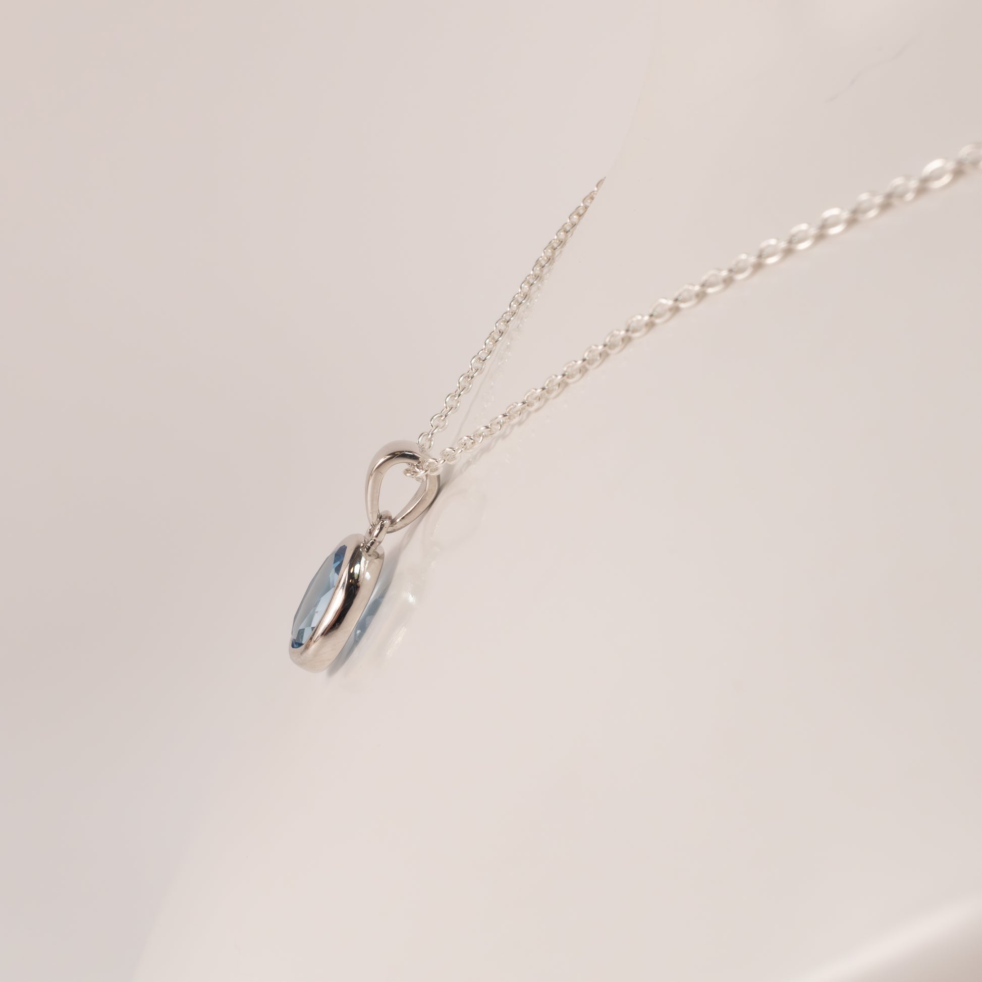 Sterling Silver Swiss Blue Topaz Oval Bezel Set Necklace