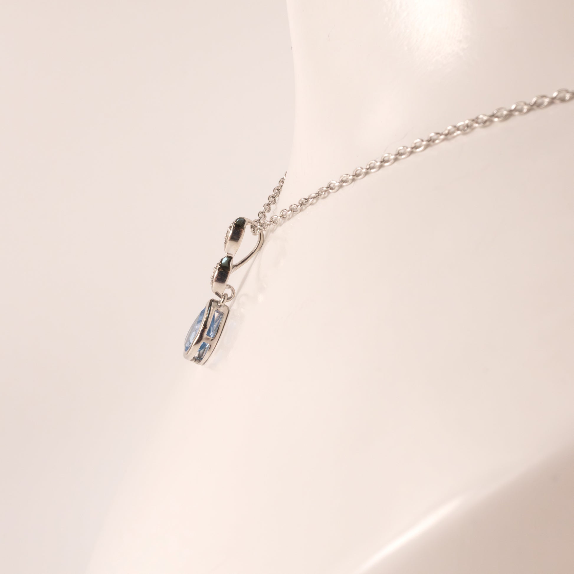 Sterling Silver Swiss Blue Topaz Pear and Diamond Bezel Set Necklace