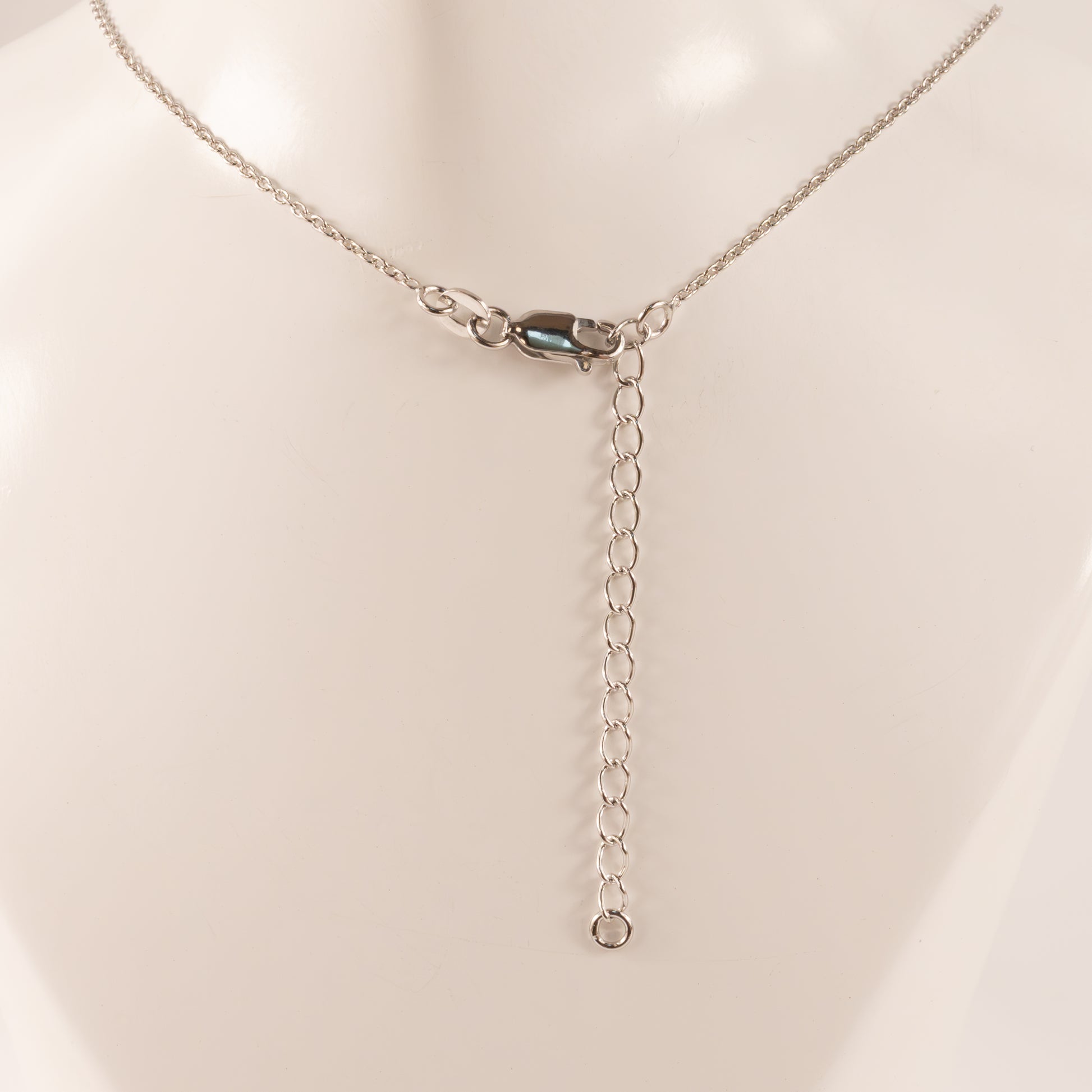 Sterling Silver Swiss Blue Topaz Pear and Diamond Bezel Set Necklace