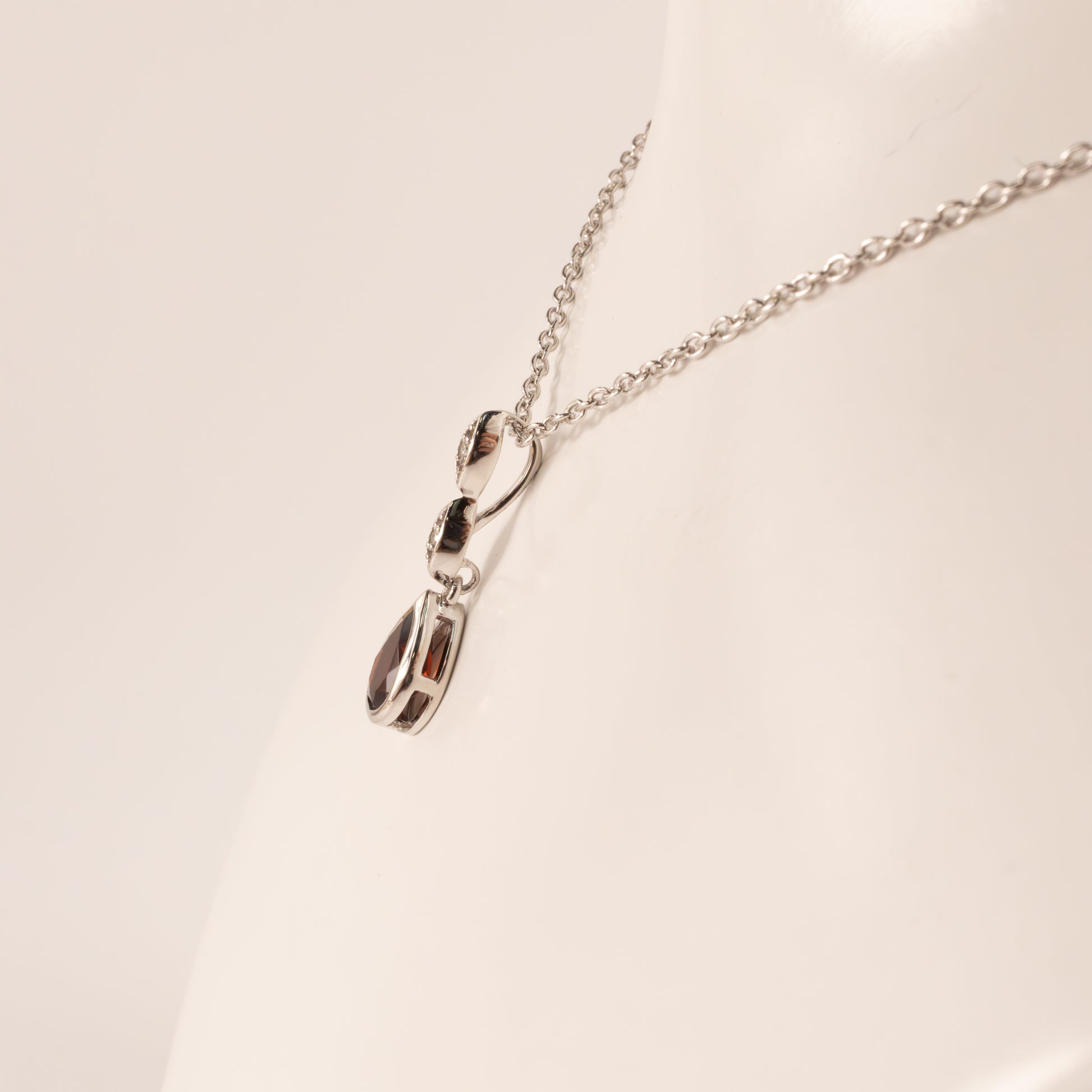 Sterling Silver Garnet Pear and Diamond Bezel Set Necklace