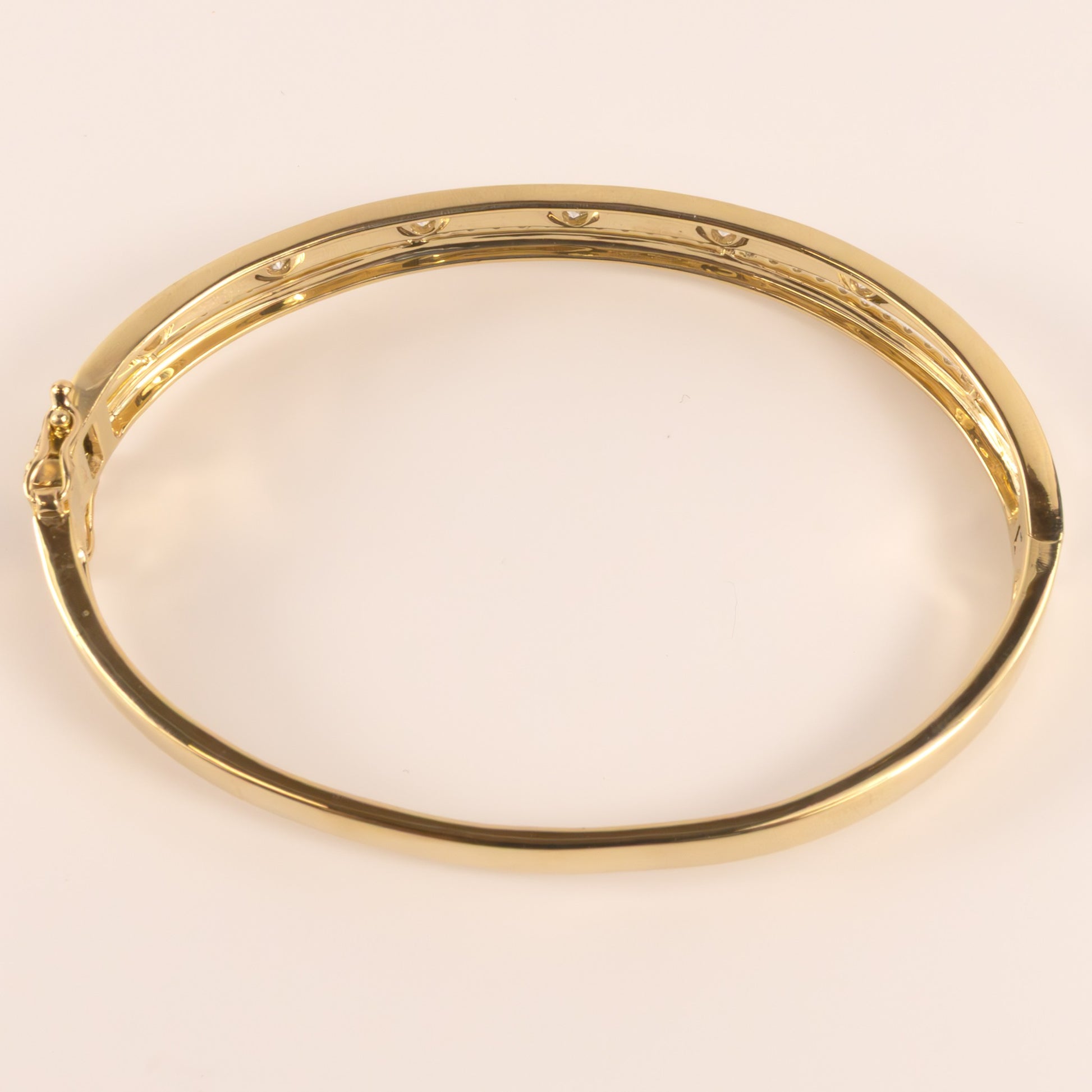 14KYG Diamond Flush and Prong Two Row Hinged Bangle Bracelet